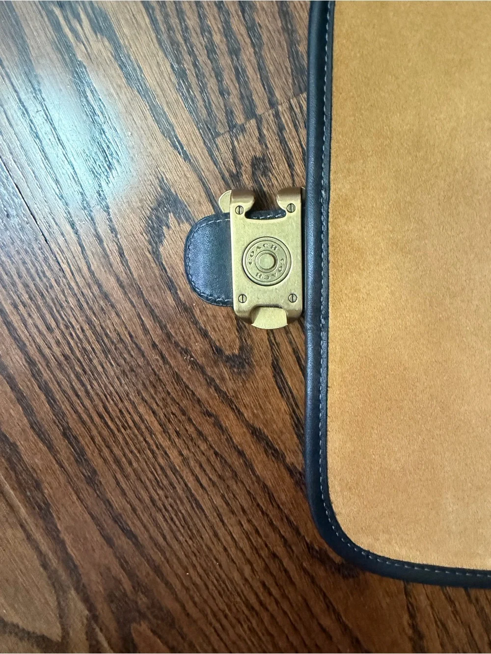 Coach Black Leather Shoulder Bag with Gold 'C' Accent